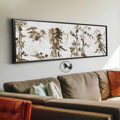 a living room filled with furniture and a painting on the wall