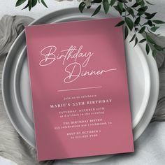 a pink birthday dinner card on a plate