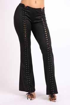 Elevate your wardrobe with our trendy lace-up detailed pants. These pants feature a unique lace-up design that adds a touch of edge and style to any outfit. -Unique lace-up detailing that adds a trendy and fashionable touch -Versatile design that can be dressed up or down for any occasion Gothic Stretch Bottoms For Night Out, Edgy High-waisted Pants For Party, Edgy High-waisted Party Pants, Gothic High Waist Bottoms For Spring, Gothic High-waist Bottoms For Spring, Gothic High Waist Pants For Spring, Gothic High-waist Party Bottoms, Gothic Party Bottoms For Fall, Gothic Fall Party Bottoms