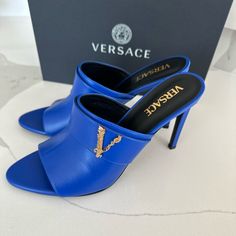 Brand New In Box Sz 40/9 Luxury Blue Mules, Blue Mules With Sculpted Heel For Party, Luxury Blue Leather Mules, Blue Open Toe Party Mules, Luxury Blue Open Toe Sandals, Blue Party Mules With Sculpted Heel, Blue Luxury Sandals For Formal Occasions, Luxury Blue Summer Heels, Elegant Blue Sandals With Sculpted Heel