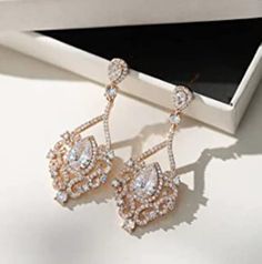 Luxurious Chandelier Gauges - Weddings Earrings - Dangle Plugs - Crystal Zircon ROSE GOLD Bridal Tunnels 6g 4g 2g 0g 4mm 5mm 6mm 8mm 1.65 inches(4.2 cm) long,  0.71 inches(1.8 cm)wide SIZES available: 8g - 3mm 6g - 4mm 4g - 5mm 2g - 6mm 0g - 8mm Regular Posts STYLE gauges: Regular Posts Acrylic Double Flared (Saddle Plugs) Stainless Steel Tunnels  (Internally Threaded) Wood Double Flared (Saddle Plugs) Notices: Please read my shop policies here: https://www.etsy.com/shop/PlugParlour?ref=seller-p Luxurious Chandelier, Earrings Gauges, Wedding Plugs, Gauges Earrings, Dangle Gauges, Stretched Ear Lobes, Stretched Ear, Dangle Plugs, Plug Earrings