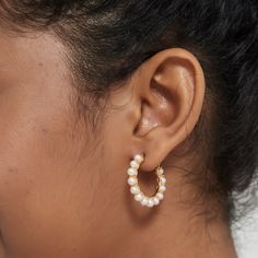 Elegant, timeless and beautiful — House of Pearls’ Circle Pearl Earrings are the perfect way to add a touch of sophistication to your formal look. Crafted with a timeless gold vermeil finish, these earrings feature a perfect circle of lustrous pearls that shimmer gracefully in the light. Whether you wear them with casual wear or a special occasion look, these earrings add a touch of poise to any ensemble. Details: Style ADiameter: 2.8cm Weight: 2.5g per earring Style BDiameter: 3.5cm Weight: 9.6 Timeless Gold Round Pearl Earrings, Classic Gold Hoop Pearl Earrings, Tarnish Resistant Gold Plated Round Pearl Earrings, Classic Gold Plated Hoop Earrings With Pearl Drop, Classic Gold-plated Hoop Earrings With Pearl Drop, Timeless Gold-plated Hoop Earrings For Weddings, Chic Small Hoop Earrings For Anniversary, Minimalist Hoop Pearl Earrings For Formal Occasions, Classic Small Hoop Gold Pearl Earrings