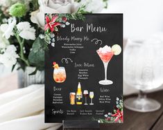 a menu card with drinks and flowers in the background