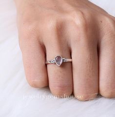 Rose Quartz Ring, 925 Sterling Silver Ring, Pear Gemstone Ring, January Birthstone Jewelry, Dainty Ring, Ring for Women, Every Day Gift Ring Gemstone Name - Rose Quartz Stone Quality - AAA  Weight - 2.19 gm  Stone Shape - As shown in the picture Ring Size - All Ring Size Available  We serve complete 925 sterling silver Jewelry and genuine properties of the stone.  The products are dispatched from the small business from UK Product Quality and Packaging - Our all products are 925 Silver Stamped which shows that the product is genuine and authentic .The products are dispatched from the small business from UK so you get the product on time and the product packaging comes in bubble foil wrap with all the precautions taken primarily that your product reaches you with zero damage. Properties of Teardrop Sterling Silver Crystal Promise Ring, Sterling Silver Teardrop Crystal Promise Ring, Sterling Silver Teardrop Crystal Ring For Promise, Sterling Silver Teardrop Crystal Ring For Anniversary, January Birthstone Jewelry, Zierlicher Ring, Jewelry Dainty, Rose Quartz Ring, Rose Quartz Stone