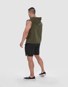 Devoteewear's new Amped oversized men's sleeveless hoodie is designed to elevate your gym game while keeping you comfortable and stylish. Made from 100% cotton, this hoodie is soft and breathable. With its oversized fit, this hoodie allows for maximum range of motion, making it ideal for lifting weights, running, or any other high-intensity activity. The sleeveless design keeps you cool and allows for optimal ventilation. Model: Sebastian is 5'11 tall, chest size 44" and wears size XL. 🚚 Ships Functional Cotton Hoodie For Gym, Athleisure Hooded Sports Vest, Hooded Athleisure Vest For Sports, Casual Sleeveless Hoodie For Workout, Casual Cotton Muscle Tee For Training, Athleisure Cotton Training Vest, Athleisure Activewear For Streetwear With Dropped Armholes, Cotton Activewear With Drawstring Hood For Gym, Sleeveless Sportswear Hoodie For Streetwear