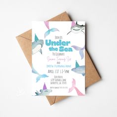 an under the sea birthday party is set on top of a card with envelopes