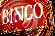 the word ringo is lit up in red and white