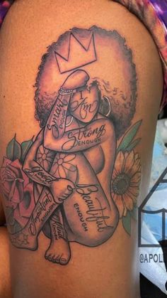 a woman with a tattoo on her thigh