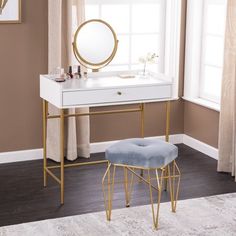 Bring bold style to your small space with this chic dressing vanity. A wide tabletop and spacious drawer provide plenty of space for makeup and accessories, while a round, gold-framed swivel mirror adds a salon feel from the comfort of your home. Tuck this small space vanity table into your studio apartment to double as a catch-all console, or place in your master suite to make getting ready a breeze. Go sleek and sophisticated with this two-tone storage vanity. From our family-owned company to Small Space Table, Vanity Table With Mirror, White Vanity Mirror, Dressing Vanity, White Vanity Table, Swivel Mirror, Storage Vanity, Makeup And Accessories, Chic Dressing