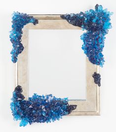 a frame with blue flowers on it