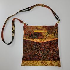 a handbag with an orange and brown design on it