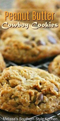 some cookies are cooling on a rack with the words peanut butter cowboy cookies above them