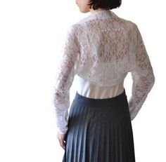 "This beautiful light Bridal lace shrug bolero with Long sleeves is * READY TO SHIP IN  white color size XS, S, M * Model on the pic have M size * Size Sleeve length 22\"-52 cm Back length-10\"-26cm *XS EU 36 US 6-8 *S EU 38 US 8-10 *M EU 40 US 12-14 * Fabric This shrug is made of quality cotton lace (cotton 20%, viscoze 75%. elastan 5 %).  * Design & Style Details The shrug is perfect for for special evening or wedding ceremony It cover your shoulders in wright way. The shrug is soft, perfect f Fitted Lace Shrug With Lace Trim, Long Sleeve Lace Shrug For Wedding, Fitted Shrug With Lace Sleeves For Spring, Long Sleeve Lace Wedding Shrug, Lace Long Sleeve Wedding Shrug, It Cover, Sleeve Bolero, Lace Shrug, Wedding Shrug