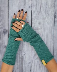 ♥  Material This long knit fingerless gloves for women are handmade with 50% wool and the rest is acrylic. This is great winter accessories and a perfect gift for girlfriend or mother.  During the cold winter these wool hand warmers will bring you joy. They are made in fashionable way so that you stand out from the crowd. ♥ Size These knitted fingerless gloves stretch so they fit easily. Still, I need some kind of information about size of your hands, that is why I have three sizes so that gloves fit better. S size of fingerless mittens is for small size hands. M size of fingerless mittens is for small size hands.  L size of fingerless mittens is for small size hands. ♥  Washing They should be washed in cold water.  ♥  Gift Perfect as gift as well for Christmas or birthday or any other occ Handmade Winter Knitting Pattern One Size, Handmade One Size Leg Warmers For Winter, Winter Gift Knitting Pattern, Handmade Fitted Leg Warmers For Winter, Cozy Handmade Knitting Pattern, Winter Crochet Knitting Pattern For Gift, Winter Gift Crochet Knitting Pattern, Winter Crochet Knitting Pattern, Gloves Christmas Gift