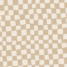 a beige and white checkered pattern on fabric