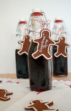 gingerbread cut out cookies in a bottle with twinklings on the tablecloth