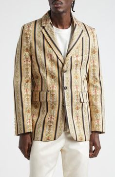 French drapes from circa 1910 served as the pattern model for this elegant single-breasted sport coat perfect for evening-out looks or formal occasions. 30" length (size 42) Front button closure Notched lapels Three-button cuffs Chest welt pocket; front flap pockets Lined 63% polyester, 22% cotton, 15% polyamide Dry clean Imported Designer Clothing Formal Shawl Collar Blazer For Spring, Formal Spring Blazer With Shawl Collar, Fitted Single Breasted Sport Coat With Shawl Collar, Fitted Single-breasted Sport Coat With Shawl Collar, Vintage Silk Blazer With Long Sleeves, Vintage Semi-formal Blazer With Suit Collar, Designer Single-breasted Sport Coat With Notch Lapel, Designer Single Breasted Sport Coat With Notch Lapel, Vintage Tailored Blazer With Hidden Button Closure