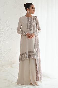 Classic Embellished Grey Pakistani Salwar Kameez Dupatta is a stunning dress to wear on a festive occasion emblazoned with Threadwork, Tilla, and Dabka. Pakistani Salwar, Raw Silk Fabric, Stitch Clothes, Pakistani Salwar Kameez, Suit Fabric, Indian Fashion Dresses, Pakistani Outfits, How To Dye Fabric, Embellished Dress