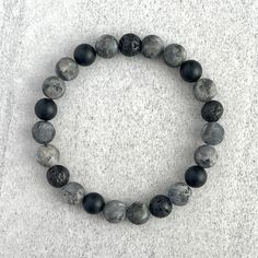 Men's beaded bracelet includes: ~ 8mm or 10mm Matte Black Labradorite beads ~ 8mm or 10mm Matte Onyx beads ~ 8mm or 10mm Black Lava beads ~ Stretchy cord; simply slide bracelet on and off wrist ~ Comes packaged in a re-usable microfiber pouch To ensure the perfect fit, please use the bracelet sizing instructions found in the photo gallery. Boy Bracelets, Male Bracelets, Bracelet Boys, Boys Bracelet, Beads Bracelet For Men, Beaded Bracelets For Men, Beaded Bracelet For Men, Mcu Dr, Mens Bracelet Black