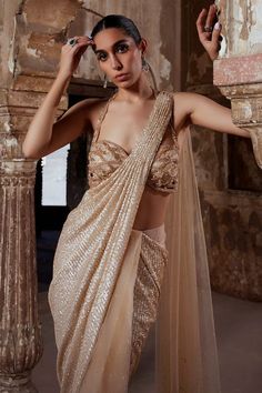 Champagne gold sequin and tulle pearl embroidered half and half saree. Paired with a sequin, cutdana and bead embellished blouse. - Aza Fashions Half And Half Saree, Saree Gowns, Dhoti Saree, Cotton Sarees Handloom, Gold Tulle, Ruffle Saree, Drape Saree, Embellished Blouse, Half And Half