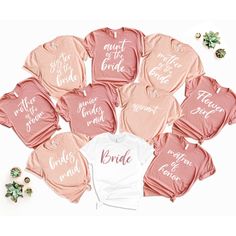 the bride shirts are laid out on top of each other, with their names printed on them