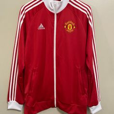 Adidas Manchester United Mufc Soccer Full Zip Track Jacket Mens L He6670 New White Track Jacket With Three Stripes For Sports Season, Red Sports Outerwear, Red Outerwear For Sports Events, Functional White Outerwear With Three Stripes Branding, Adidas Outerwear For Sports Events, White Sports Outerwear With Three Stripes Branding, Red Sportswear Outerwear For Sports Events, Three Stripes Branded Outerwear For Sports Events, Outerwear With Three Stripes Branding For Sports Events