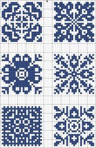 the cross stitch pattern is in blue and white, with four different designs on it