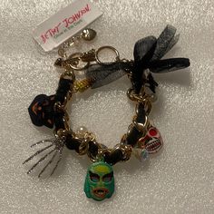 Selling To Buy Betsey Pieces I Need. This Is From The Halloween Collection. The Bracelet Is Adorned With Lots Of Charms Of A Rhinestone Hand, Candy Corn, Cat And Among More. Glows In The Dark. Nwt Betsey Johnson Alley Cat, Betsey Johnson Jewelry Necklaces, Betsey Johnson Bracelet, Betsey Johnson Skull Purse, Vintage Betsey Johnson, Cat Charm Bracelet, Black And White Heart, Floral Bracelet, Betsey Johnson Jewelry