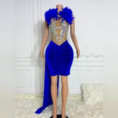 Elevate Your Birthday Look With A Stunning Royal Blue Feather Dress That Exudes Elegance And Sophistication. This Sexy Mini Dress Features Intricate Applique Detailing That Will Make You Stand Out On Your Special Day. Blue Club Dresses For Party Season, Blue Evening Dress For Party Season Night Out, Glamorous Royal Blue Party Evening Dress, Glamorous Blue Party Evening Dress, Glamorous Blue Evening Dress For Party, Fitted Royal Blue Evening Dress For Party Season, Royal Blue Fitted Party Dress, Glamorous Royal Blue Dress For Party, Glamorous Blue Party Dress