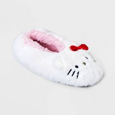 Step into comfort and style with Women's Faux Fur Hello Kitty Slipper Socks with Grippers. Crafted with durable knit fabric, these slippers offer cozy comfort. The mid weight fabric provides the perfect balance of warmth and breathability. Featuring a hello kitty design and secure grippers, this product makes a perfect addition to your lounge wear collection. Cute Soft Synthetic Slippers, Playful Slip-on Winter Slippers, White Synthetic Winter Slippers, Cute Winter Socks With Cat Design, Cute Cat Design Socks For Winter, Cute Cat Design Winter Socks, Cute White Cat Design Socks, Playful Non-slip Winter Slippers, Playful White Synthetic Slippers