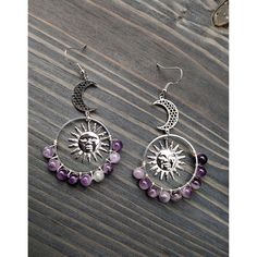 "Celestial Crescent Moon Dangle Earrings with Amethyst Gemstones Sun & Moon Handmade Nickel Free 925 Sterling Silver Copper Plated Hooks Approximate length: 3\" Amethyst is believed to have healing properties that protect the bearer against negative energies. Some believe that the stone's calming properties produce soothing dreams by making us more in tune with the divine. The stone also brings clarity and peacefulness to the waking mind, as they help the mind flow freely in both the mental and metaphysical dimensions." Purple Bohemian Crystal Earrings, Handmade Purple Celestial Earrings, Adjustable Purple Moon Phase Jewelry, Purple Celestial Dangle Earrings, Celestial Purple Dangle Earrings, Bohemian Purple Moon Phase Jewelry, Bohemian Amethyst Moon Phase Jewelry, Purple Bohemian Jewelry With Moon Charm, Bohemian Purple Jewelry With Moon Charm