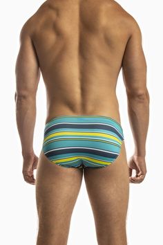 Jack Adams Multi Stripe Low Rise 1" Swimsuit Be bold in or out of the water wearing this colorfully Multi-Stripe printed swim brief. Eco friendly style is durable, chlorine resistant fabric that won't fade or stretch out any time soon. Drawstring waistband with a contour pouch that is lined and includes a small inner pocket to cradle your jewels and to keep everything in place as you swim. UV50+ sun protection Sizing: True to size. Model is wearing size medium. Fit: Low-rise pouch. Pouch: Double Swim Brief, Printed Swim, Eco Friendly Fashion, Be Bold, Drawstring Waistband, Stripe Print, Yellow Black, Sun Protection, Low Rise