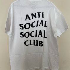 Anti Social Social Club Logo Tee Ss20 New In Bag With Tags. Never Been Worn! This Has A Small Hole On The Bottom Back. This Is A Great Spring And Summer Outfit! Fast Shipping! Product Detail Brand: Anti Social Social Club Model: Tee Color: White If You Have Any Questions Please Don't Hesitate To Message Me. Trendy Summer Tops With Logo, Urban Short Sleeve Top With Logo, Summer Cotton Shirt With Logo Print, Summer Tops With Logo In Relaxed Fit, Relaxed Fit Summer Tops With Logo, Summer Relaxed Fit Tops With Logo, Basic Summer Streetwear Shirt, Casual Cotton Shirt With Back Print, Summer Relaxed Fit Shirt With Logo Print