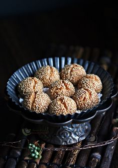 some food is in a metal bowl on a table