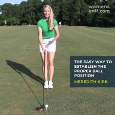 a woman is playing golf on the grass