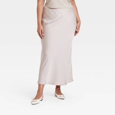 Dress up for brunches, lunches or dinners in chic style with this Maxi Slip Skirt from A New Day™. This maxi-length slip skirt is made from lightweight satin fabric for all-day comfort, while the full elastic waistband lends a secure fit. Tailored in a high-rise silhouette with a slim fit for a flattering look, you can pair this skirt with your fave tops and footwear for versatile ensembles. A New Day™: Style that goes wherever you do. Maxi Slip Skirt, Slip Skirt, Womens Tie, Women Maxi, Bottom Clothes, A New Day, Satin Fabric, New Day, Dresses Online