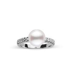 This 9.0-10. mm AAA quality White South Sea pearl ring showcases the pure organic beauty of elegant south sea pearl. The flawless pearl appears to float above the gold, yet is securely attached by a strong post. The classic-style ring features a solid 14-karat gold band that is set with 0.25 carats of diamonds. The ring setting is made in-house and is composed of solid 14 karat gold. We use an extra-fine diamond grade (VS1-G), which is normally reserved for solitaire settings. It's rare to see t Timeless White Akoya Pearl Ring, White Akoya Pearl Timeless Ring, Classic White Gold Pearl Drop Ring, Classic White Gold Pearl Ring With Pearl Drop, Classic White Pearl Ring With Charm, Classic White Pearl Ring With Pearl Charm, Classic Round Pearl Ring With Pearl Drop, Classic Pearl Ring With Pearl Drop, White Gold Pearl Ring With Pearl Drop