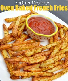 oven baked french fries on a white plate with ketchup in a small bowl