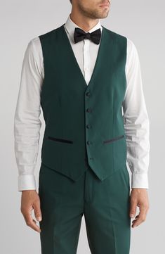 Bring understated elegance to the table in this three-piece tuxedo crafted from rich fabric in a classic single-breasted silhouette. Jacket has shawl collar; chest welt pocket; front welt pockets Vest has front button closure; V-neck Pants have zip fly with button closure; front slant pockets; back button-welt pockets Jacket and vest are lined; trousers are lined to the knee 65% polyester, 35% viscose Dry clean Imported Pocket Vest, Peak Lapel, Rich Fabric, Pocket Jacket, Understated Elegance, Formal Outfit, Hunter Green, Three Piece, Shawl Collar