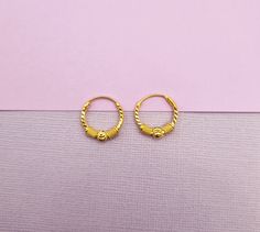 22k solid gold hoop earrings-UK 916 hallmark The hoop is approximately 15mm and 18mm in diameter. 15mm hoops - 15.7mm outside diameter and 13mm inside diameter. Our 22k jewelleries are genuine real gold. This is a special gift for baby, child, girlfriend, wife, daughter, mum, family or friend. It is a perfect gift for Christmas, New year, Valentines day, christening, birthday, wedding, anniversary and any special occasion.. Each item is packaged in our branded packaging, so your order is ready to be gifted.  All items are ready to be shipped within 2 working days through tracked post unless otherwise stated. For UK customers your order shall arrive within a week (most cases in 3 days) For customers outside the UK, your orders are ready to be shipped within 2 working days through tracked po 22k Yellow Gold Huggie Earrings As Gift, Yellow Gold Huggie Nose Ring Gift, Traditional Hoop Huggie Earrings Gift, Traditional Small Hoop Huggie Earrings For Gifts, Traditional Small Huggie Earrings As A Gift, Gift 22k Gold Small Hoop Earrings, 22k Gold Small Hoop Earrings As Gift, 22k Gold Small Hoop Earrings For Gifts, Yellow Gold Hoop Earrings As Festival Gift