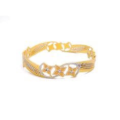 This 22k gold floral bangle, weighing 24.7 grams, is a harmonious blend of yellow, white, and rose gold. Sized at 2.6 with a 2.35" opening, it features an intricate floral design that exudes charm and elegance. The luxurious finish makes it a versatile accessory, perfect for adding a touch of sophistication to any look. A stunning balance of craftsmanship and beauty, this bangle is a timeless piece that will stand out in any jewelry collection. PRODUCT DETAILS Gold Purity(karat): 22k Gold Weight(grams): 24.7 Item Finish: Yellow + White + Rose Gold Size: 2.6 Bangle Opening: 2.35" Number Of Pieces: 1 Bangle Gold Fusion Bangle For Formal Occasions, Gold Diamond Bracelet With Intricate Design For Wedding, Yellow Gold Bangle Bracelet With Intricate Design, Gold Filigree Bangle For Anniversary, 22k Gold Bangle For Anniversary, Gold Fusion Bangle With Intricate Design, 22k Gold Anniversary Bangle, 22k Gold Filigree Bangle In Yellow Gold, Traditional Gold Diamond Bangle Bracelet