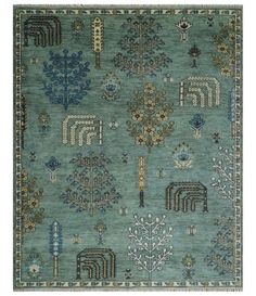 a blue rug with various designs on it