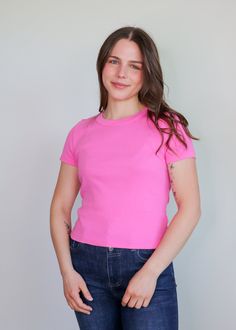 The Mimi tee from Michael Star is not too long and not too short. We love this basic cropped tee with its high crew neckline, short sleeves, and body-skimming silhouette. The perfect length for your mid to high-rise bottoms. Pair with your favorite cut off shorts all summer long. Details: 100% Cotton, medium weight Machine Washable One Size (fits like a true medium) Basic Pink Cropped T-shirt With Short Sleeves, Fitted Pink Cropped T-shirt With Short Sleeves, Basic Pink Cropped T-shirt, Pink Fitted Cropped T-shirt With Short Sleeves, Pink Stretch Cropped T-shirt For Spring, Basic Cropped T-shirt For Everyday, Basic Everyday Cropped T-shirt, Trendy Solid Color Cropped T-shirt For Everyday, Spring Basic Stretch Cropped T-shirt