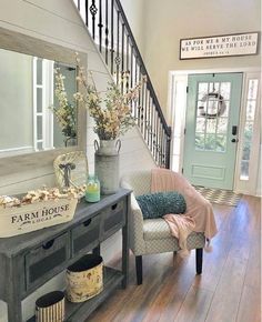 an image of a room with a table and mirror on it's display shelf