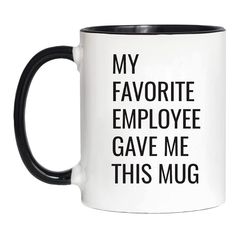 a black and white coffee mug that says, my favorite employee gave me this mug