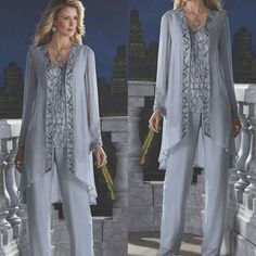 mother of the bride pant suits with long sleeves and lace details on the top