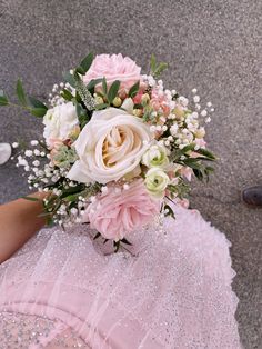 a bridal bouquet in pink and white