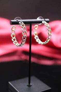 Gold Rope Chain Link Hoop Earrings feature a distinctive design combining the classic hoop shape with intertwined rope chain links, creating a stylish and textured look. The gold finish adds a touch of glamour to these earrings, making them a versatile accessory that seamlessly transitions from casual to more formal settings. Earrings Making, Cz Bracelet, Gold Rope Chains, Hinged Bracelet, Chain Links, Chain Earrings, Tennis Bracelet, Rope Chain, Gold Trim