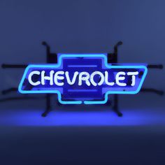 a neon sign that says chevrolet on it