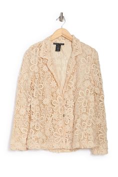 Perfect for your upcoming Zoom meetings, this tonal embroidered lace blazer jacket adds refined styling to your weekly rotation. Spring Embroidered Notch Lapel Blazer, Chic Long Sleeve Blazer With Floral Embroidery, Long Sleeve Lace Blazer For Spring, Elegant Lace Trim Blazer For Spring, Formal Lace Outerwear With Lace Trim, Elegant Embroidered Spring Blazer, Formal Long Sleeve Outerwear With Lace Trim, Elegant Lace Trim Outerwear For Spring, Elegant Spring Outerwear With Lace Trim